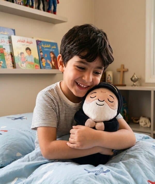 A Lebanese and maronite boy hugging the Saint Charbel plush toy in his bedroom