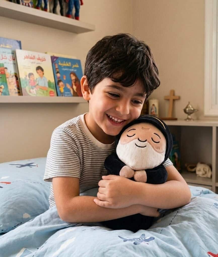 Boy hugging his Saint Charbel plushie, a Catholic gift for kids